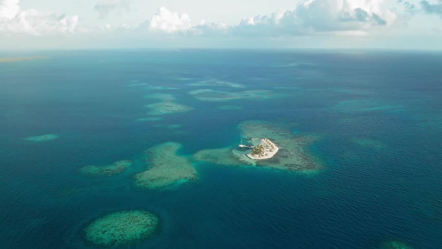 Birds eye view of an island in the middle of the water