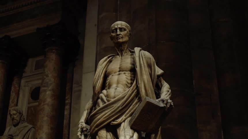 A close up of a statue