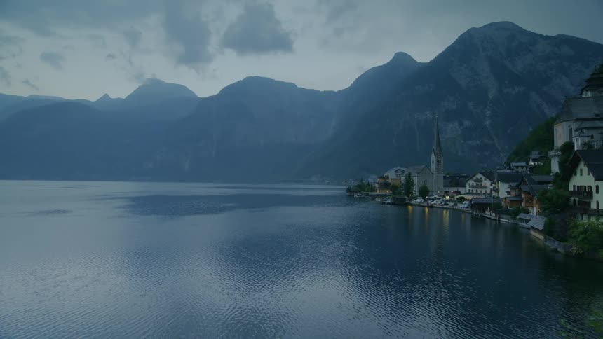Landscape view of seaside village with the mountains in the background
