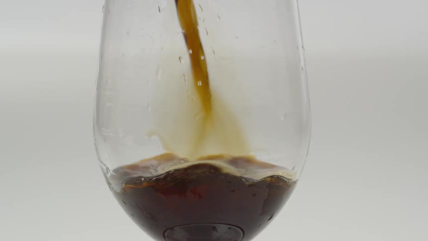 Wine being poured in to a wine glass