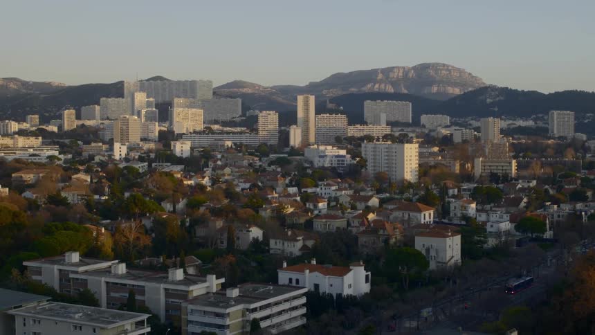 A city near the mountains during the day