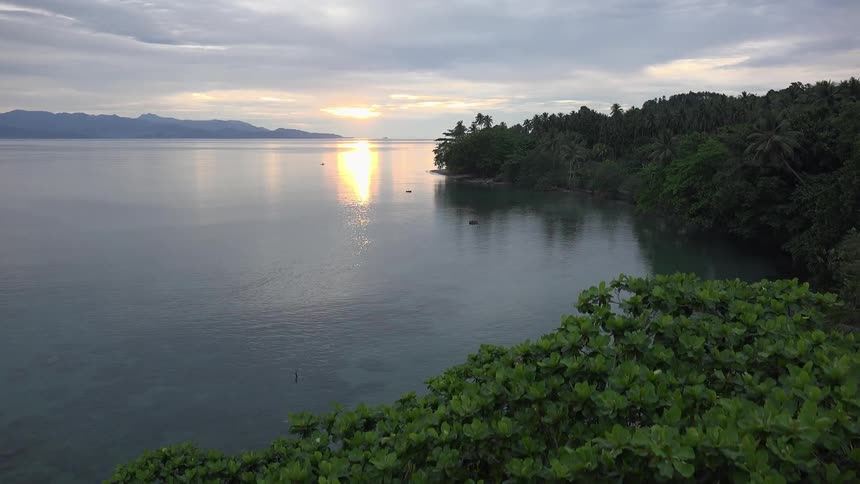 Aerial view of a lake at sunrise