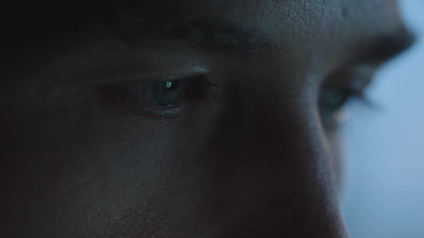 Close up of a man with his eyes closed and then he opens them