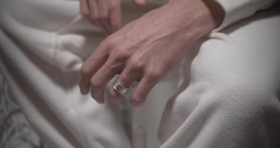 A persons fingers twitch