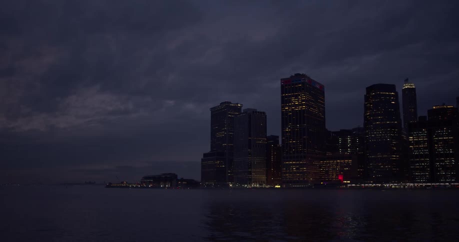 Skyscrapers on the coast of a city during the night
