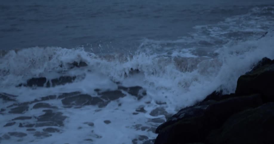 Waves rolling in to a rocky coastline