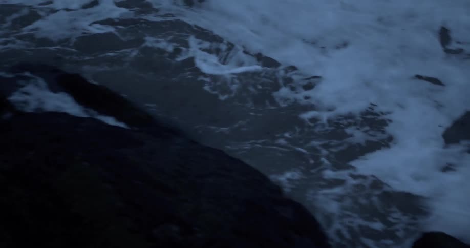 Waves crash on a beach