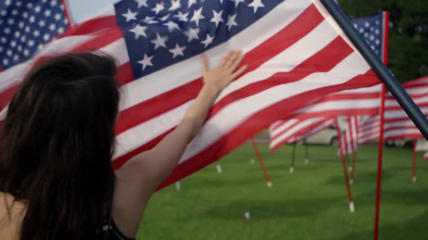 American flags billow in the wind