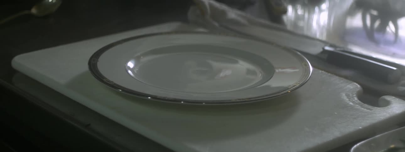 A clean and shiny plate sitting on a table