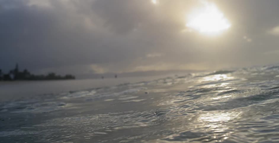 Water ripples on an ocean surface on a cloudy day