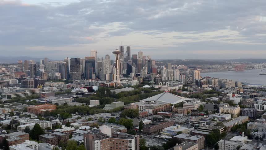 An aerial view of a futuristic city skyline