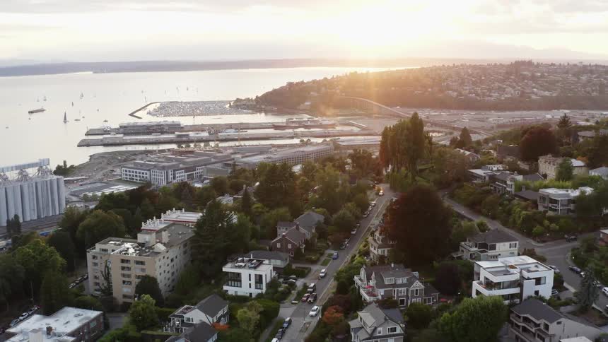 Sprawling town bordering the ocean occupies both sides of inlet