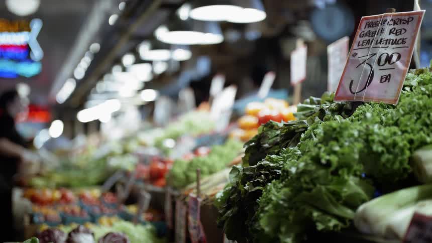 People are shopping at a grocery store