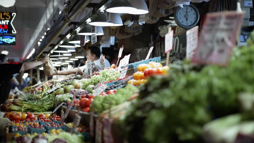 Farmers market stands full of produce