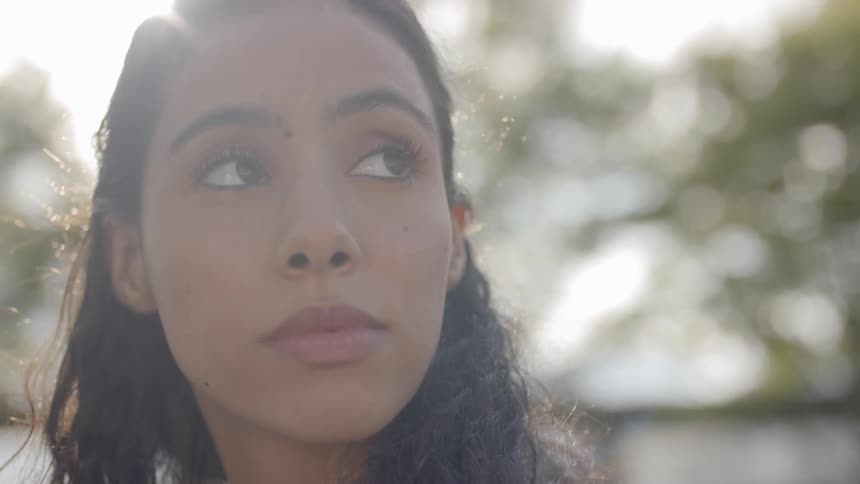 A young woman looking at something off camera