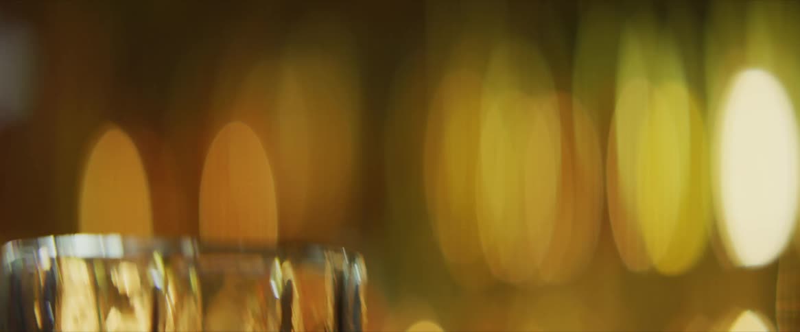 A person lifts a glass
