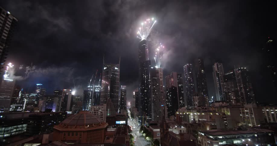 Beautiful footage of a fireworks party on city skyline at night