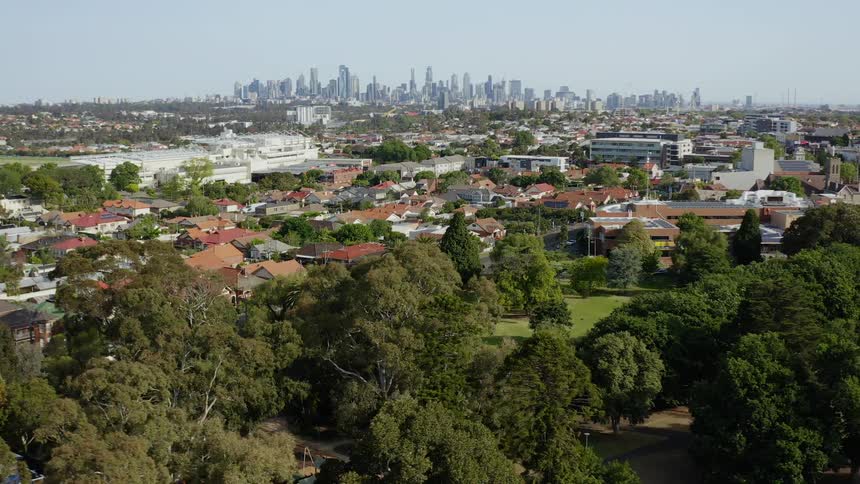 Aerial of metropolis city with skyline of buildings in the distance