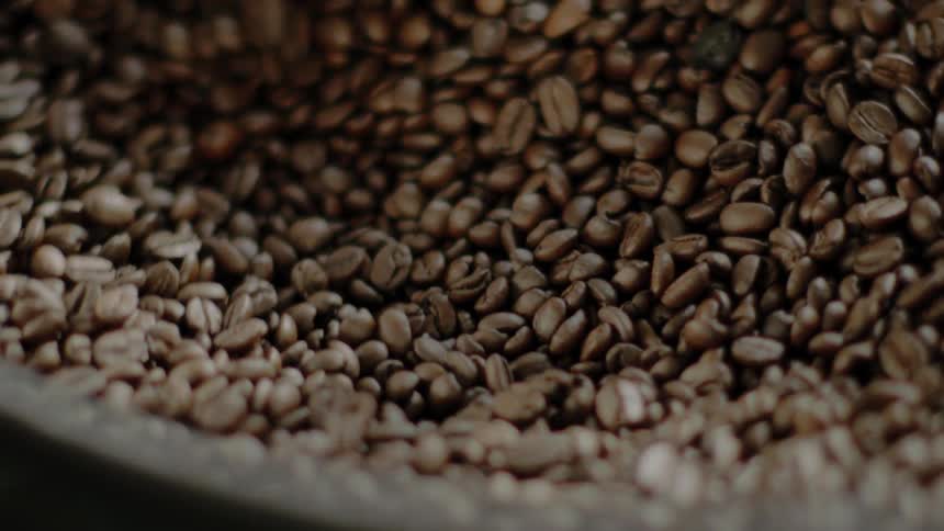 A coffee machine grinding coffee beans