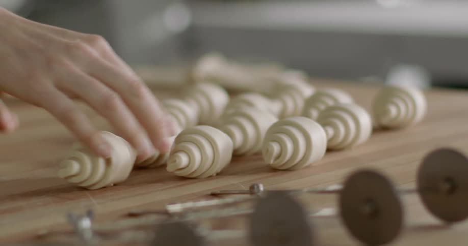Womanmakes crescent rolls