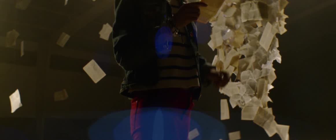 A portrait of a woman enjoying an art installation