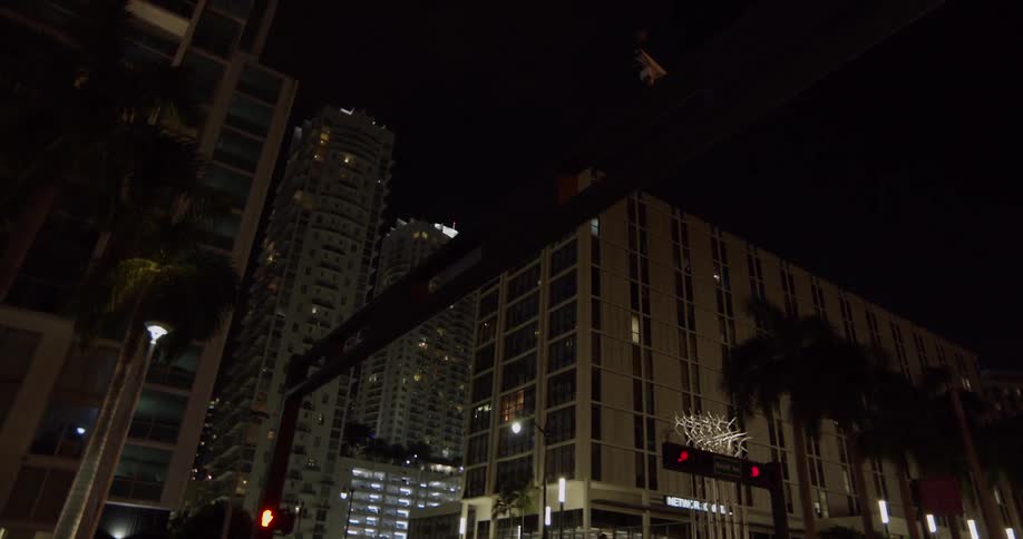 A downtown part of a city at night