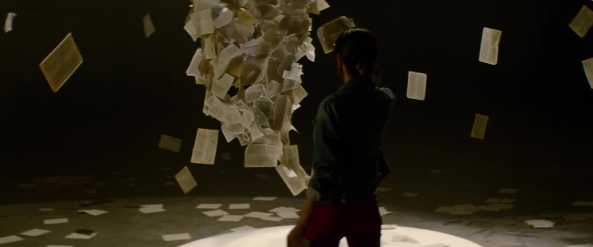 A portrait of a young woman enjoying art installation