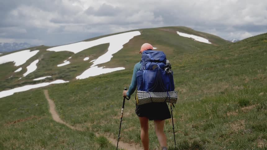 A man hiking alone at the mountain