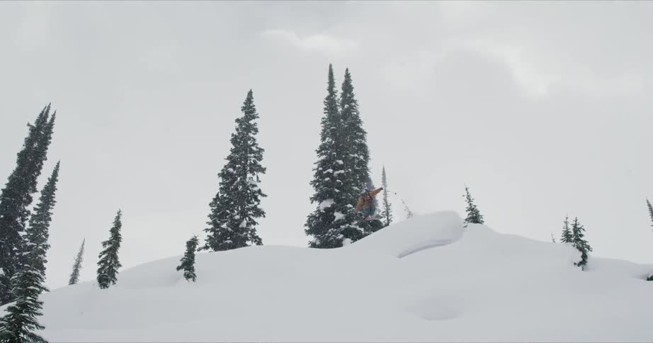 A footage of man jumping from the top of mountain