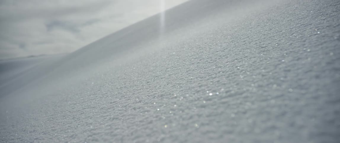 Snow shimmering and glistening from the sunlight