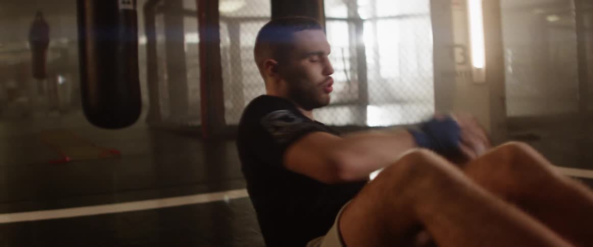 A man works out in a fighting gym