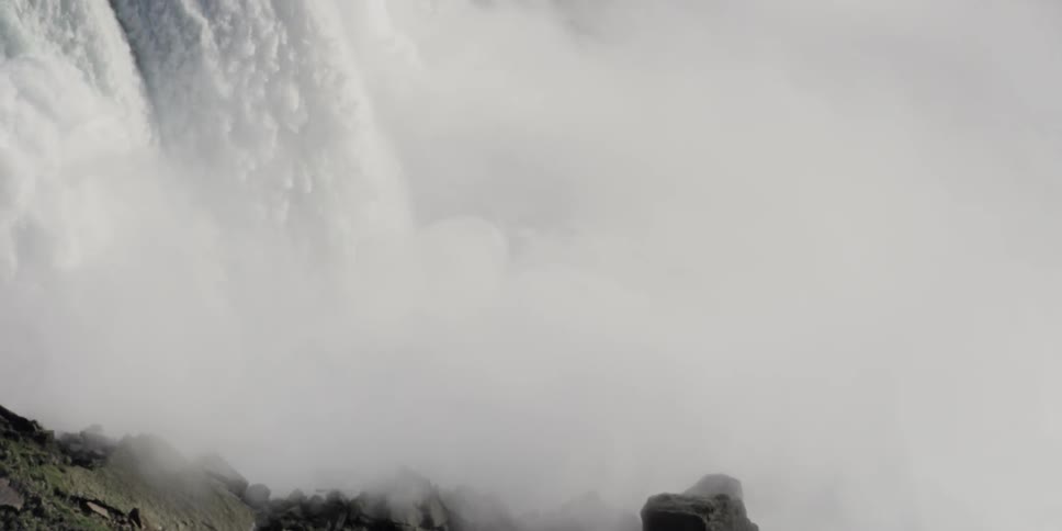 Close up of waterfall rushing down rapidly from canyon