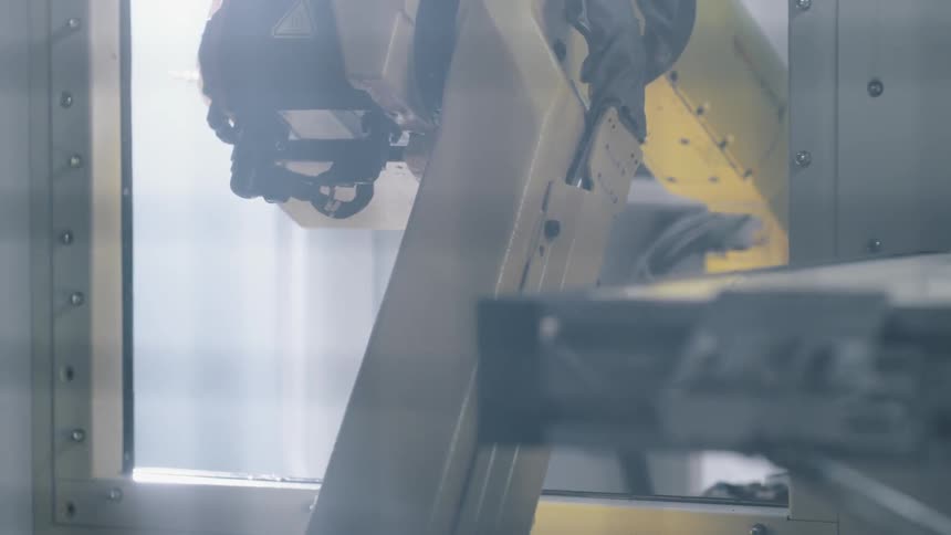 A scenery of a robotic arm in action