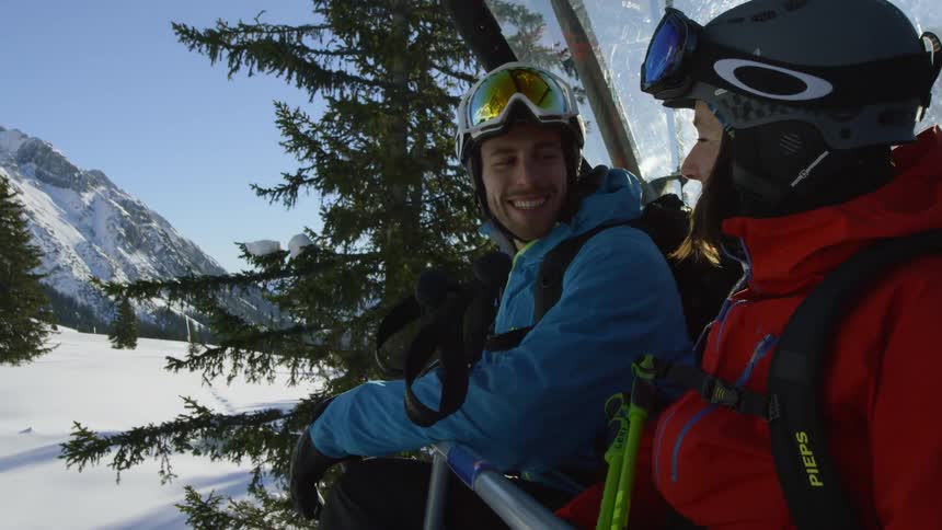 Men enjoying the cable car