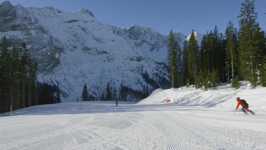 A footage of a man skiing at the mountain