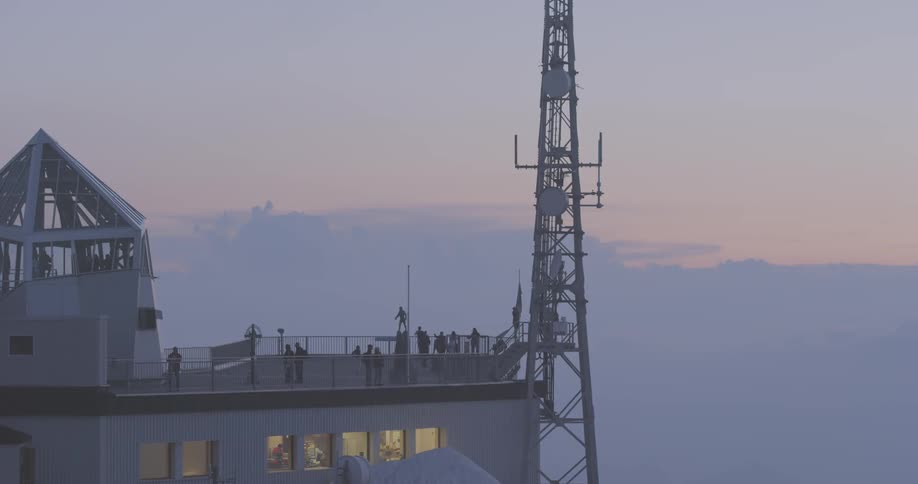 A scenery of a roof top on a building at dawn