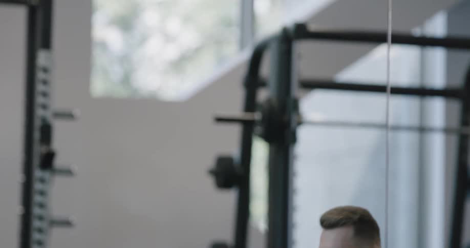 A man is working out in a gym