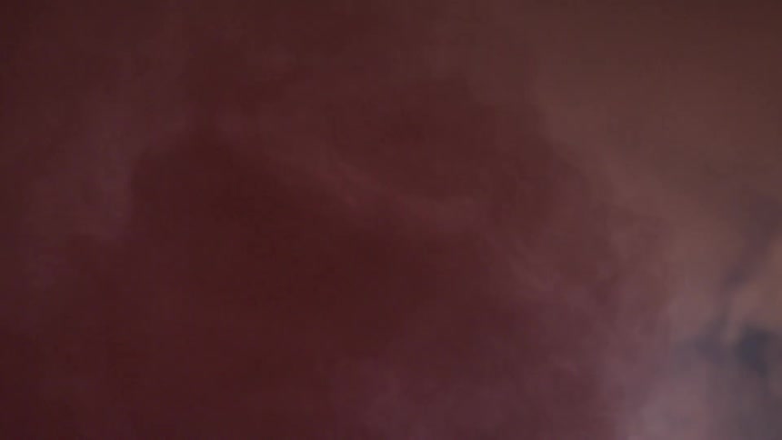 A footage of a red smoke