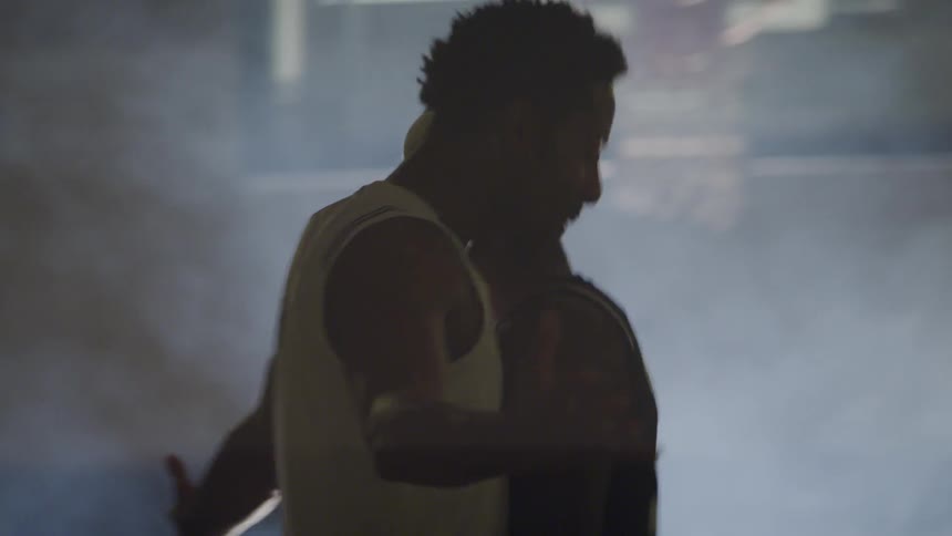 Basketball player having a fight on the court