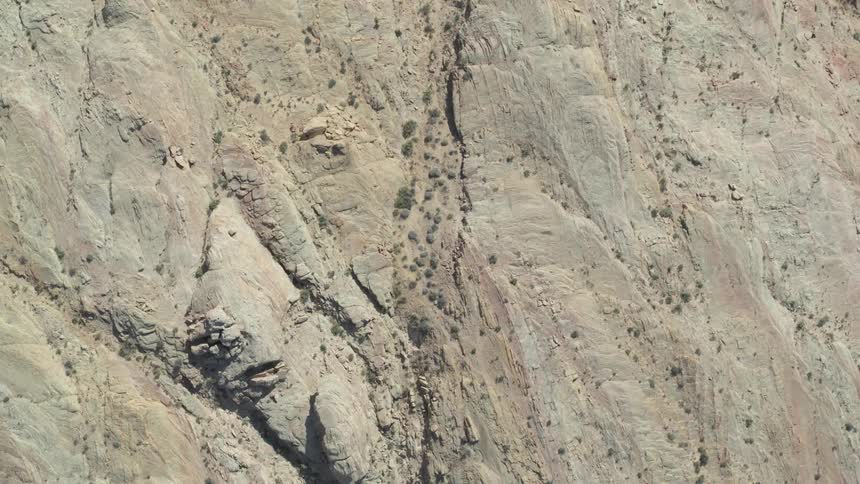 An aerial view of a rocky landscape in a desert