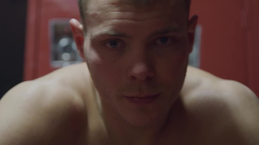 A man is working out in a room