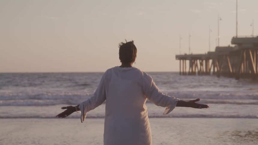 A man enjoying beach on the windy days