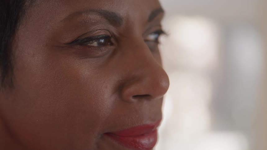 Close up of a woman face looking to the right