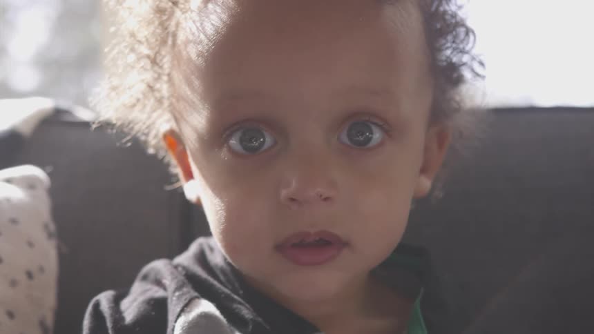 A child portrait looking at the camera