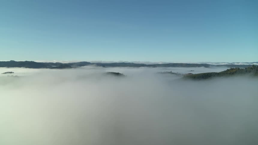 A scenery of mountain peak above the cloud