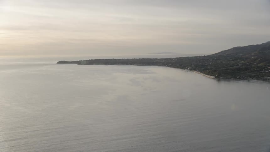 Land slopes downward to ocean