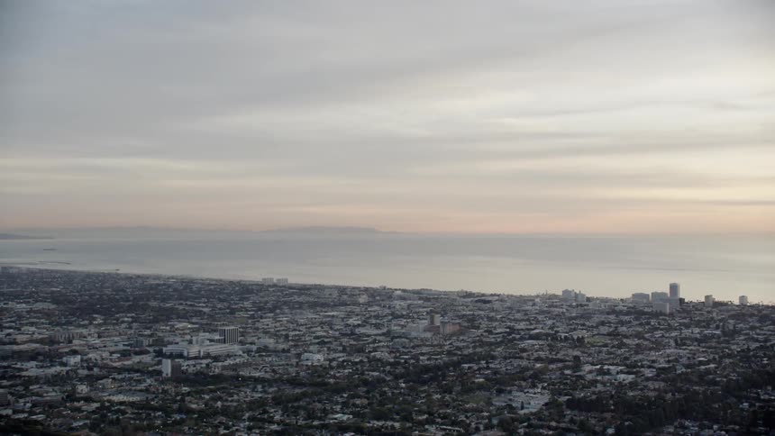 A city sits next to the ocean