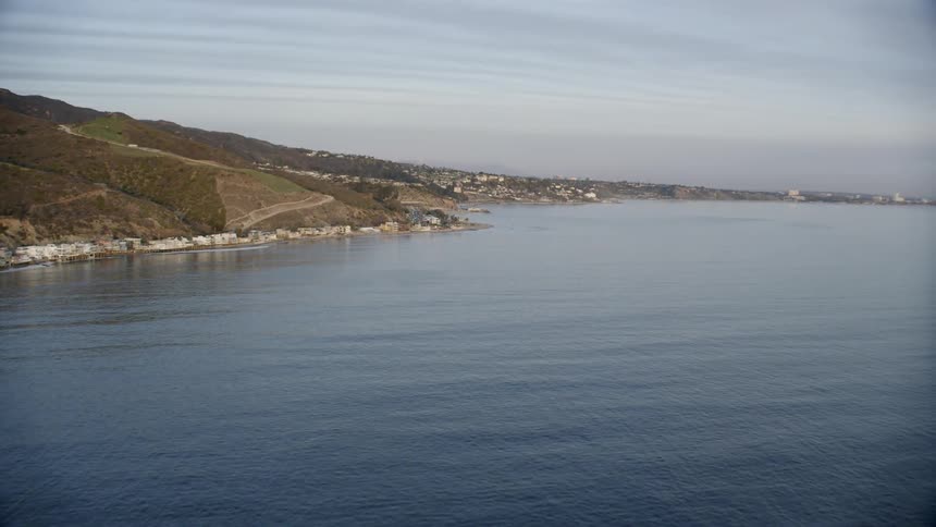 A shoreline with the sky in the background