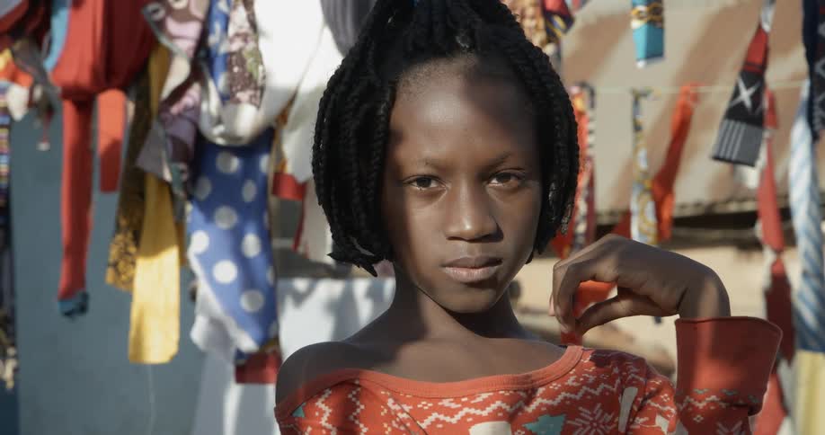 A portrait of a black girl in the rural country