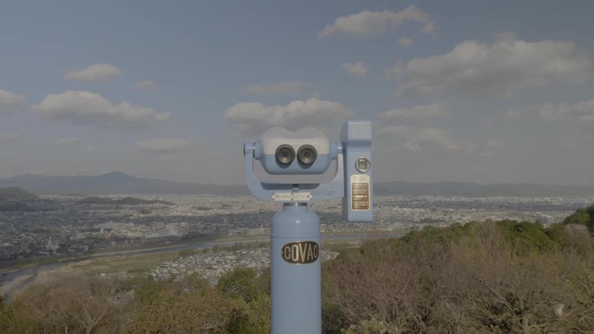 A footage of a binoculars in the high ground